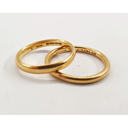 551 - Two 22ct gold wedding rings (finger sizes K and L1/2), total weight approx. 5g (2)