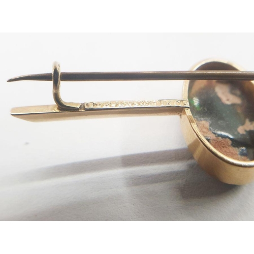 552 - Australian gold bar brooch by Stevenson, set with an opal cabochon, marked 'Stevenson 15ct', 5.5cm l... 