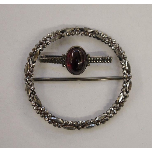 553 - Georgian cut steel buckle of circular form, 8cm diameter and a marcasite bar brooch set with central... 