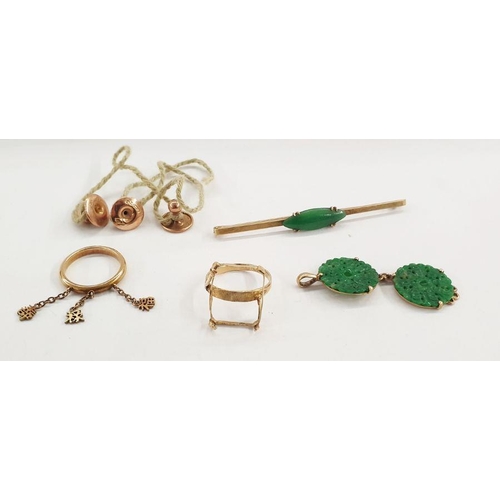 557 - Gold bar brooch set with oval jade plaque, marked 15ct, a gold-coloured pendant set with two pierced... 