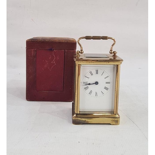 72 - Brass and five-sided glass carriage clock in leather carry case, with Roman numerals to the dial, 11... 