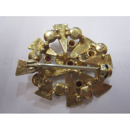 455 - 9ct gold, ruby and pearl abstract brooch, oval, set with five claw set rubies surrounded by pearls, ... 