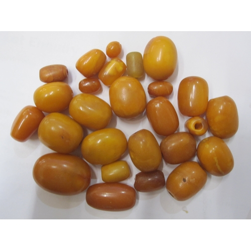 446 - Quantity of yellow, orange, opaque amber beads, graduated and unstrung