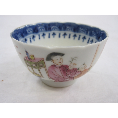 129 - Chinese porcelain teabowl and saucer with polychrome painted figures in a garden and beside window a... 