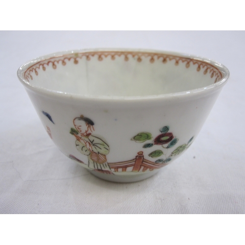 129 - Chinese porcelain teabowl and saucer with polychrome painted figures in a garden and beside window a... 