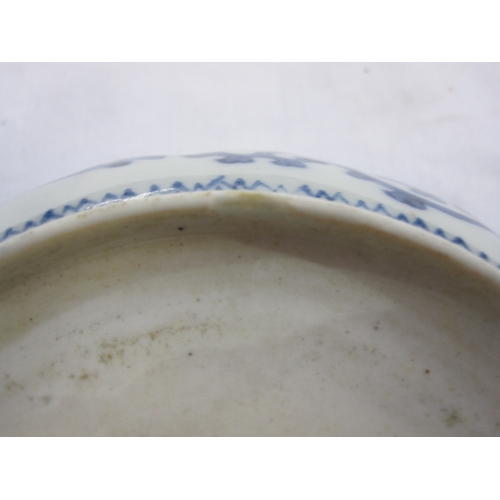 140 - Set of three Chinese porcelain bowls, each slightly lobed and with ogee moulded border, painted in b... 