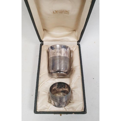 231 - A Christofle silver-plated christening set, mid-century, comprising a cup of beaker form with reeded... 