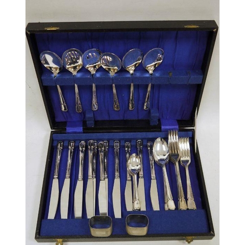 263 - Silver napkin rings, rounded oblong, engine turned and a boxed service of EPNS table flatware having... 