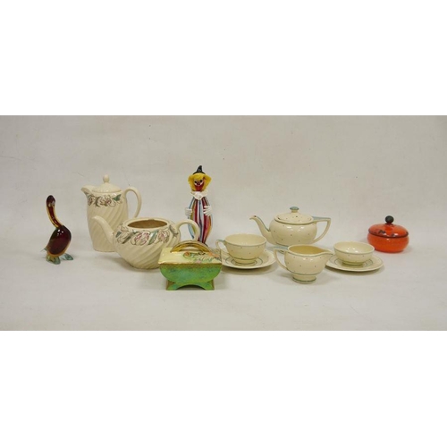 39 - Susie Cooper part tea service painted with pink spots within green bands, comprising a teapot and co... 