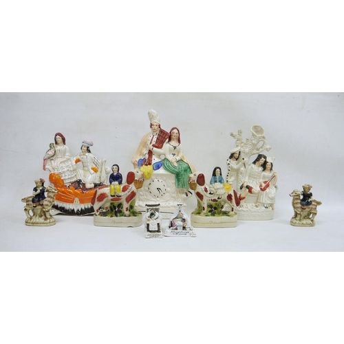 46A - Group of Staffordshire and Staffordshire-style pottery figures, circa 1860 and later, including a Hi... 