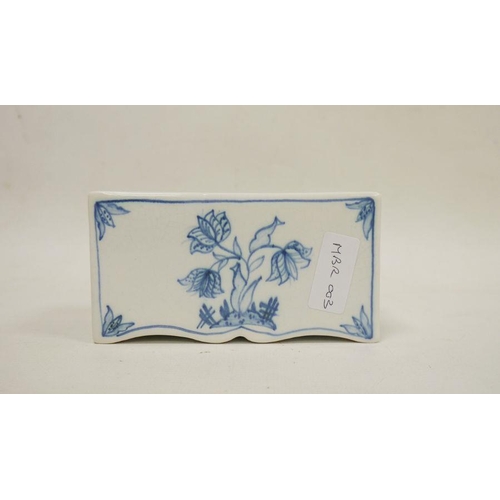 55 - Isis (Oxford) pottery rectangular flower brick, 20th century, blue marks, painted with a tulip patte... 