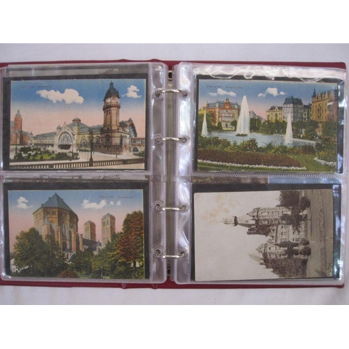 222 - Two albums containing early 20th century postcards of common poems, UK coastal scenes, architecture ... 