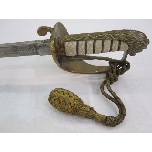 266 - Royal Navy officer's dress sword with white fish skin grip, brass pommel in the form of a lion and d... 