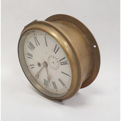 1007 - Ship's type clock with circular dial and Roman numerals, subsidiary seconds dial, in brass casing