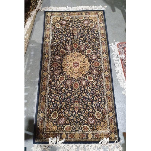 1039 - Modern Persian-style rug with central gold ground medallion on black ground foliate decorated field ... 