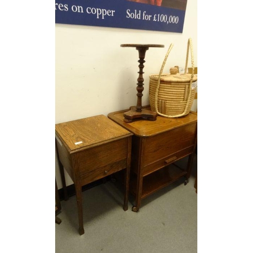 1094 - Two 20th century oak sewing boxes, a mahogany turned wine table on triform base and three squat feet... 