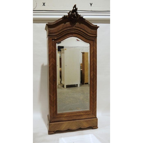 1155 - Continental walnut armoire with carved pediment, mirrored door, on bracket feet, 104cm x 240cm