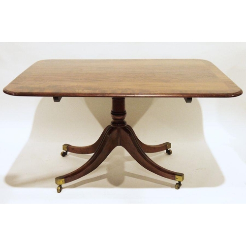 1171 - Regency mahogany tilt-top table, the rectangular crossbanded top with rounded corners, to single ped... 