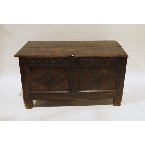 1333 - Possibly 17th century and later oak coffer, the rectangular top with moulded edge, diamond carved fr... 