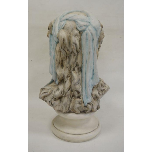 156 - Ceramic bust of a woman, blue scarf headdress, on circular socle, 48cm high