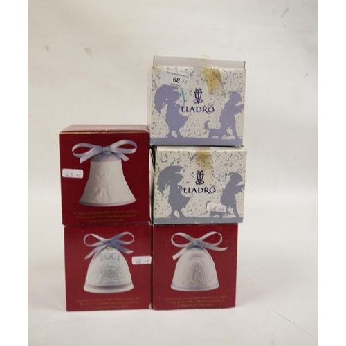 18 - Five Lladro bisque porcelain Christmas bells,  each tied with a little pink ribbon, 1995, 1999, 2000... 