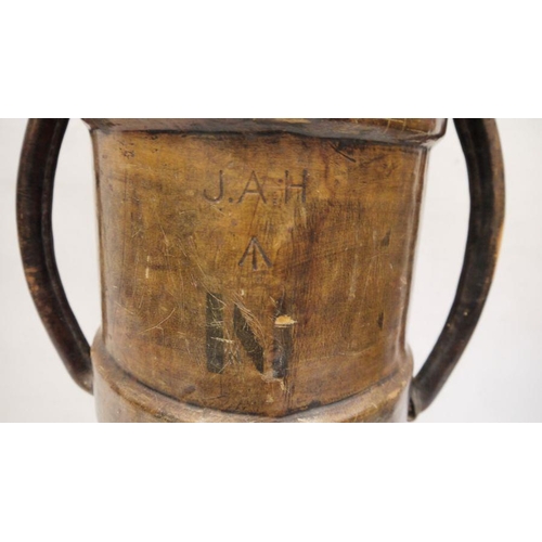 202 - WWI twin-handled leather artillery shell carrier marked 'JAH' and with the Armed Forces arrow to the... 