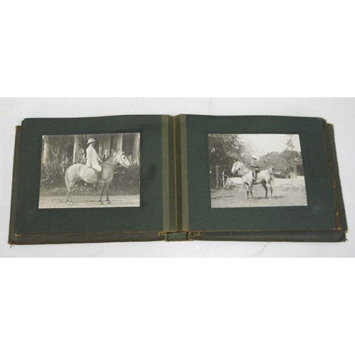 218 - Photograph album and contents of black and white vintage photographs to include figures on horseback... 