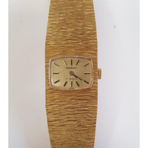 356 - Lady's Rotary rolled gold-coloured metal wristwatch with bark-pattern flexible bracelet and in origi... 