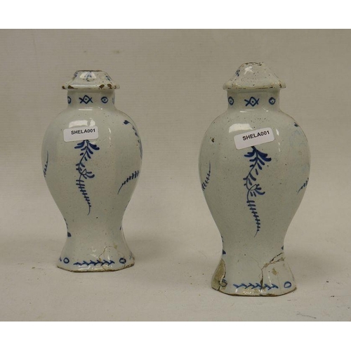 61 - Pair of Dutch Delft baluster vases and fixed covers, 18th/19th century, blue 108 over star mark, eac... 