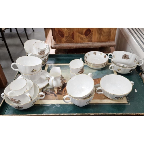 10 - Royal Worcester china dinner service, mainly for six, decorated in brown and blue with foliage and f... 