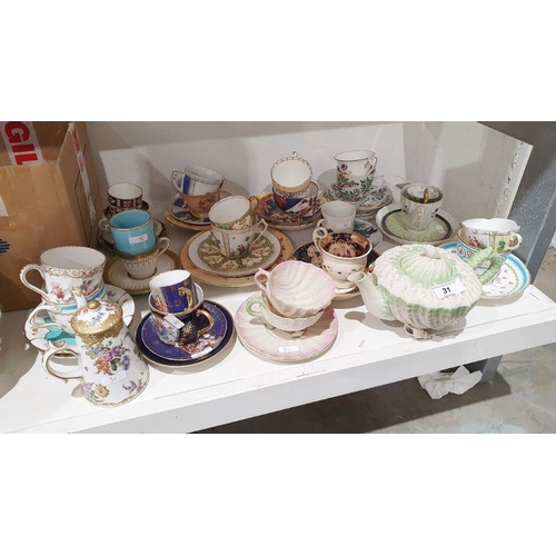 31 - Belleek shell teapot, two cups and saucers, quantity of various cabinet cups and saucers and other d... 