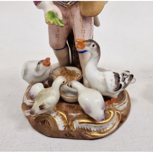 52 - 19th century Meissen figure of boy feeding ducks, on gilt scroll decorated circular base, 12cm high ... 