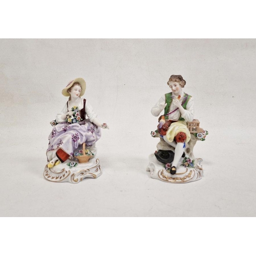 53 - Pair continental porcelain figures of lady seated with flowers and basket of flowers at her feet, th... 