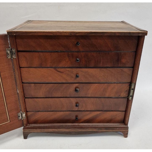 1029 - 19th century rosewood specimen cabinet with single banded cupboard door enclosing six drawers, to br... 