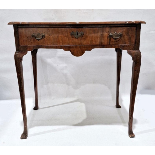 1056 - Georgian-style walnut single drawer side table, the shaped top with moulded edge, above single drawe... 