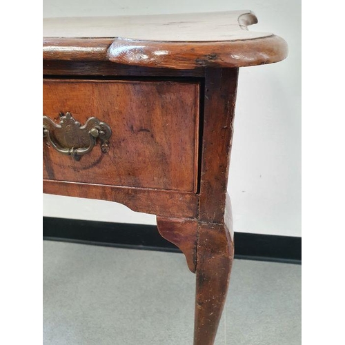 1056 - Georgian-style walnut single drawer side table, the shaped top with moulded edge, above single drawe... 