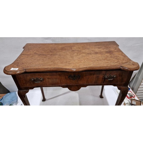 1056 - Georgian-style walnut single drawer side table, the shaped top with moulded edge, above single drawe... 