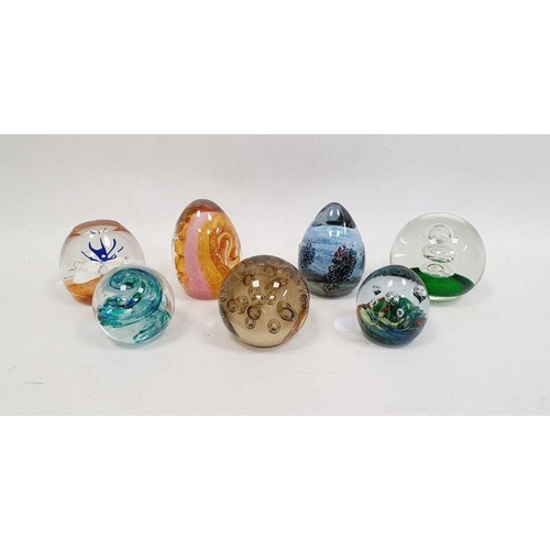 110 - Collection of glass paperweights to include a Tyne Valley glass paperweight with green and blue swir... 