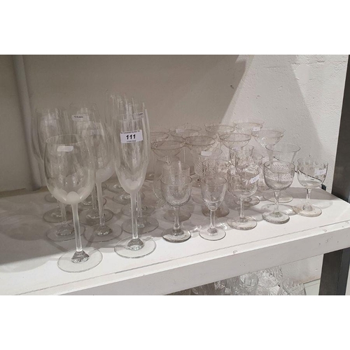 111 - Set of eight Victorian glass champagne saucers with etched decoration and further assorted wine glas... 