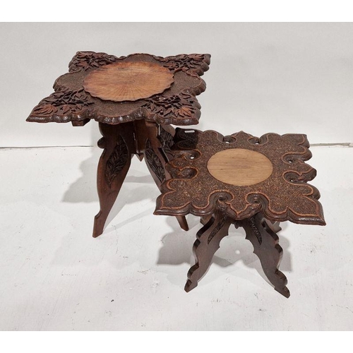 1203 - Two Eastern-style coffee tables with carved and shaped top, folding bases (2)