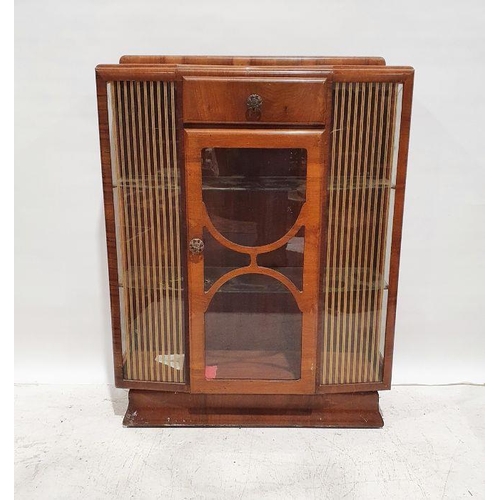 1217 - 20th century walnut display cabinet in the Art Deco manner, single drawer above glazed door, glass s... 