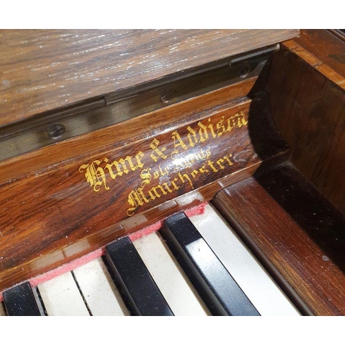 1257 - Bluthner rosewood upright pianoforte, iron-framed and overstrung, no.56725 with brass hinged candle ... 