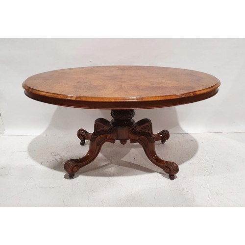 1281 - Victorian oval walnut loo table, the oval top with moulded edge, on turned and carved pedestal suppo... 