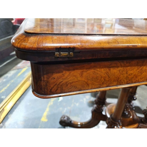 1334 - Victorian burr walnut card table, the rectangular top with rounded corners and moulded edge, open to... 