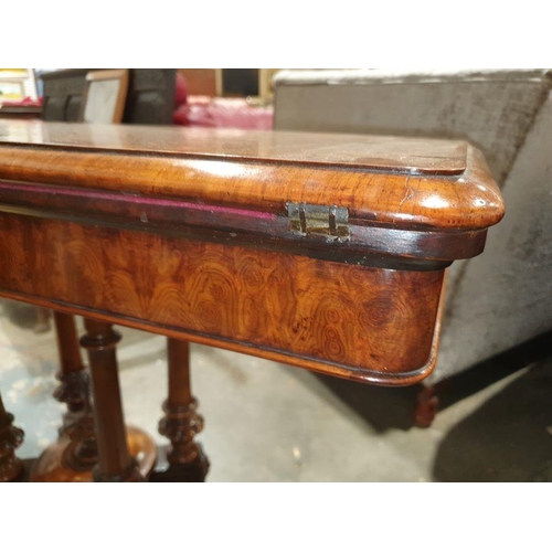 1334 - Victorian burr walnut card table, the rectangular top with rounded corners and moulded edge, open to... 