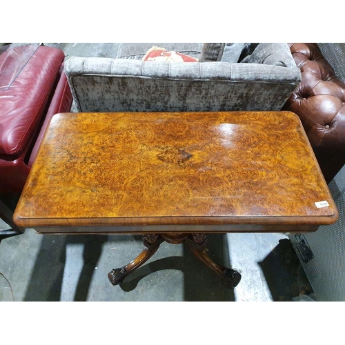 1334 - Victorian burr walnut card table, the rectangular top with rounded corners and moulded edge, open to... 