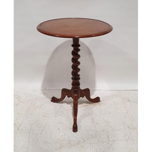 1349 - 20th century mahogany occasional table, the circular dished top on barleytwist support to tripod bas... 