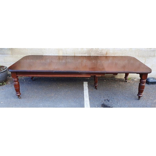 1373 - Victorian mahogany extending dining table, rectangular with curved corners, double mould edge, on he... 