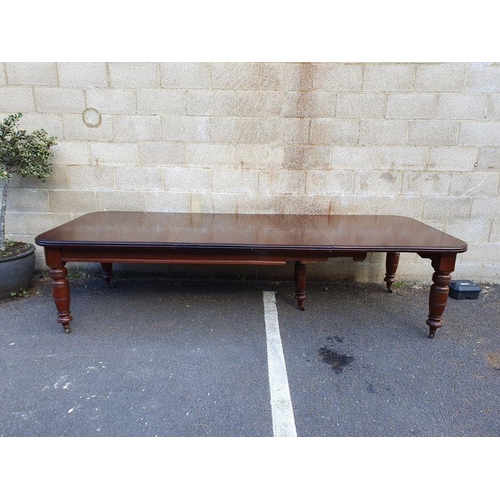 1373 - Victorian mahogany extending dining table, rectangular with curved corners, double mould edge, on he... 