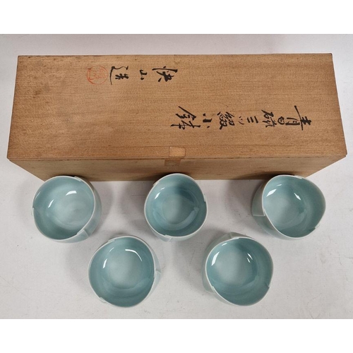 138 - Set of five Kaiji Tsukamoto (1912-1990) pale celadon ground porcelain teabowls (5)